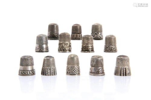 GROUP OF TWELVE SILVER THIMBLES 65g