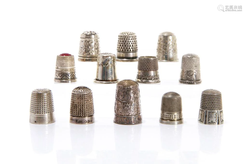 GROUP OF TWELVE SILVER THIMBLES 75g