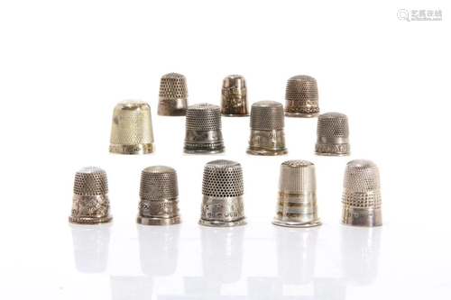 GROUP OF TWELVE SILVER THIMBLES 38g