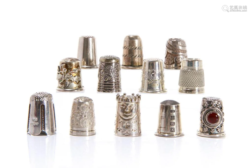 GROUP OF TWELVE SILVER THIMBLES 82g