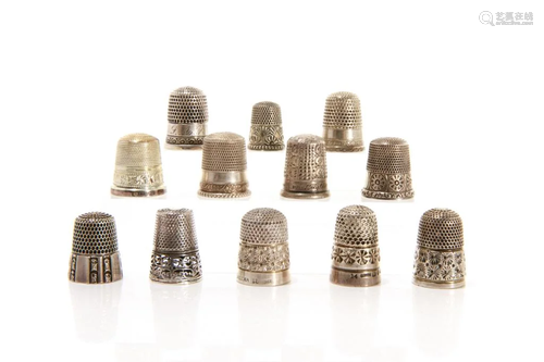 GROUP OF TWELVE SILVER THIMBLES 60g