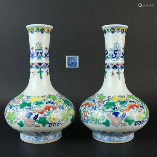 A Pair of Doucai Floral Porcelain Bottle Vases