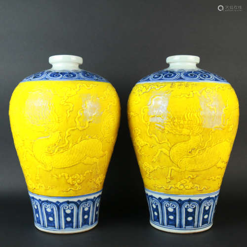 A Pair of Blue and White Yellow Glazed Carved Porcelain Plum Vases