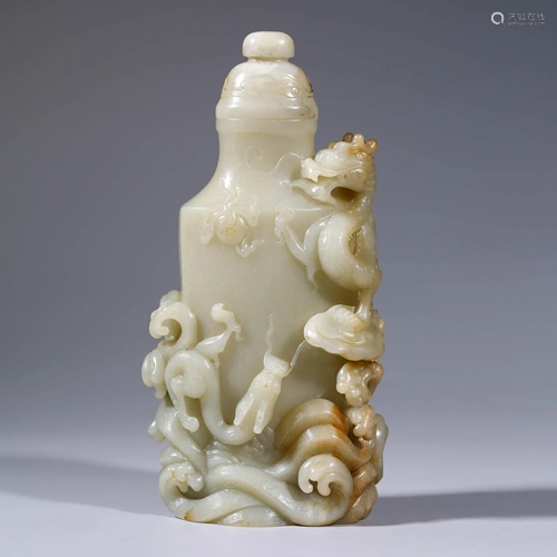 A JADE DRAGON CARVED VASE WITH COVER