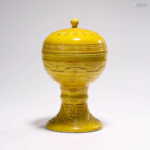 A YELLOW GLAZED STEAMING VESSEL & CO…