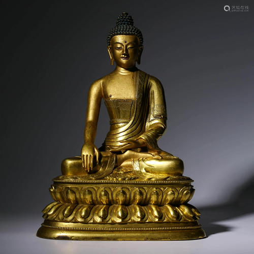 A GILT-BRONZE SAKYAMUNI