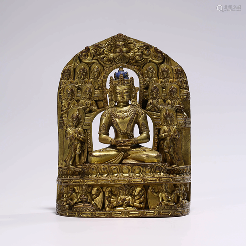 A GILT BRONZE SAKYAMUNI