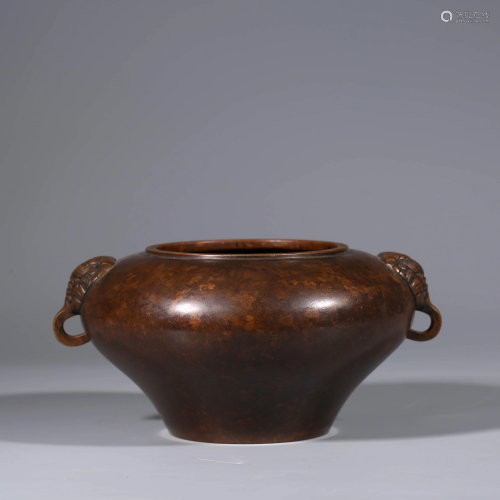 A BRONZE CENSER WITH DOUBLE HANDLES