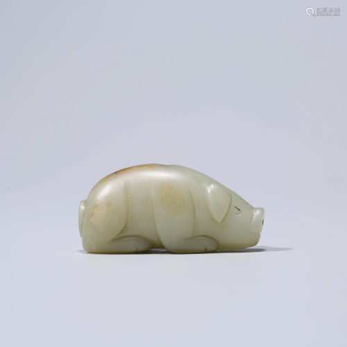 A WHITE JADE PIG INCENSE STAND