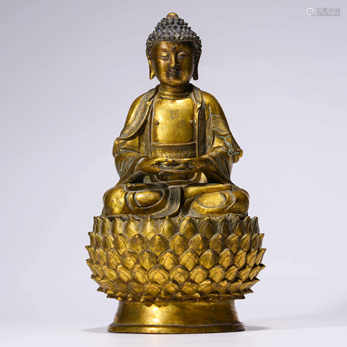 A GILT-BRONZE SAKYAMUNI