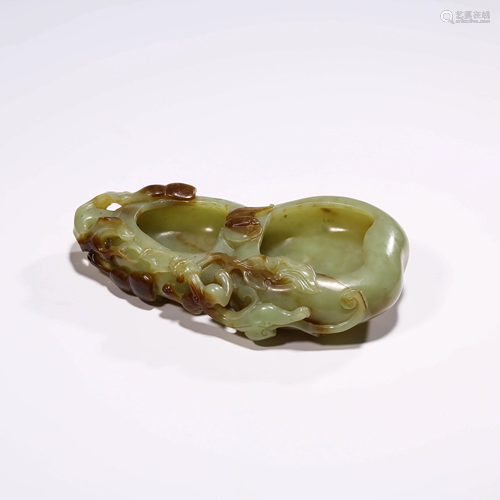 A YELLOW JADE DOUBLE-GOURD SHAPED …