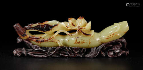 A yellow jade 'lotus root' brushrest 18th century