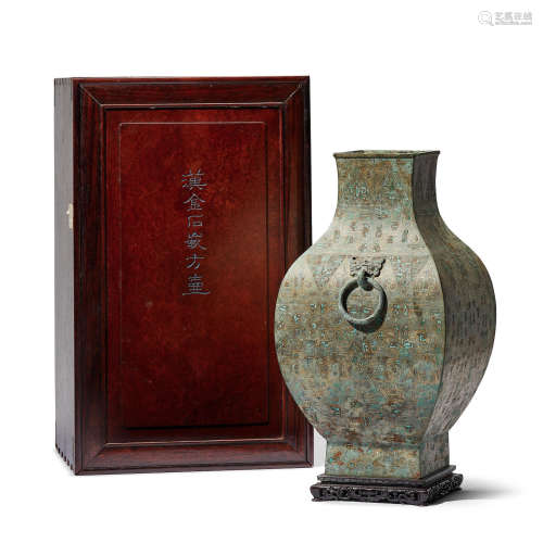 A rare and large bronze gold-and-malachite-inlaid ritual wine vessel, fanghu Warring States Period