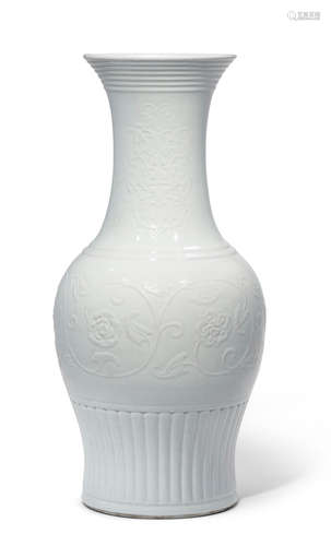 A very rare and large white-glazed relief-decorated vase Yongzheng seal mark and of the period