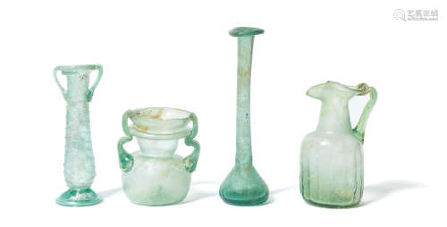 Four Roman green glass vessels 4