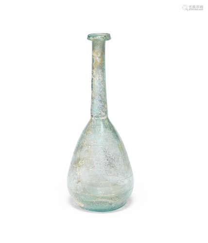 A Roman pale green glass flask