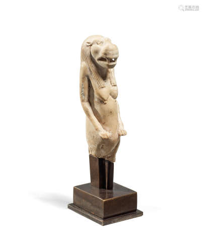 An Egyptian indurated limestone figure of Taweret