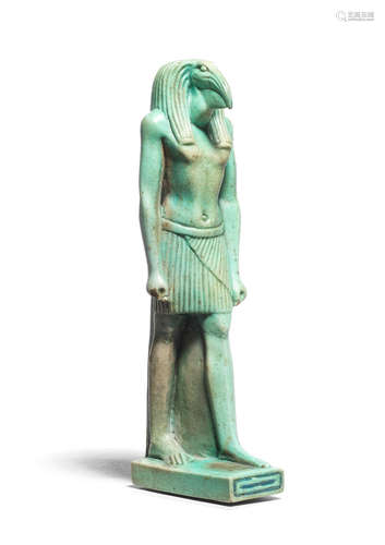 A large Egyptian turquoise glazed composition amulet of Thoth