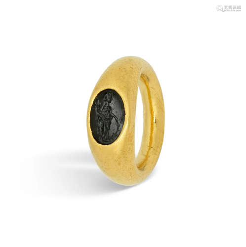 A Roman gold ring with green plasma intaglio of Fortuna