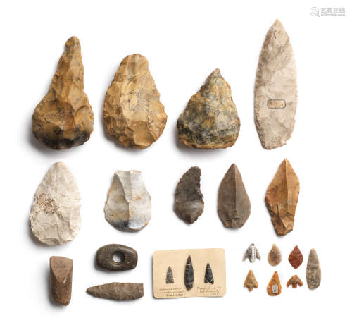 A collection of Palaeolithic and Neolithic axes and flint tools together with a large grey leaf-shaped grey flint blade, 22