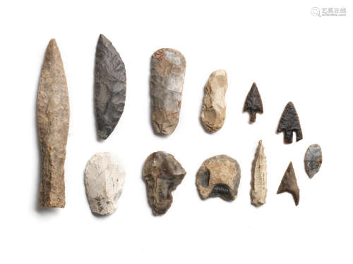 A Danish flint dagger and eleven Neolithic flint implements together with four other flints 16