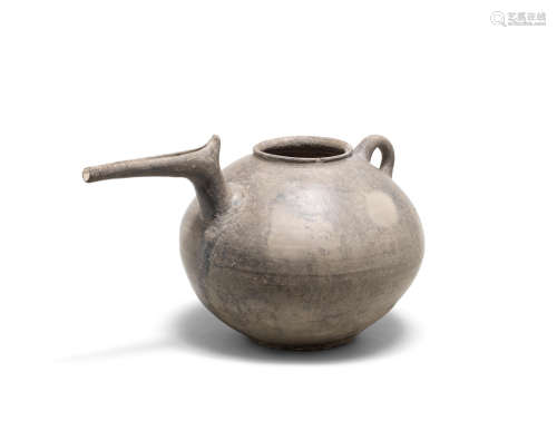 An Iranian grey-ware pottery spouted jar