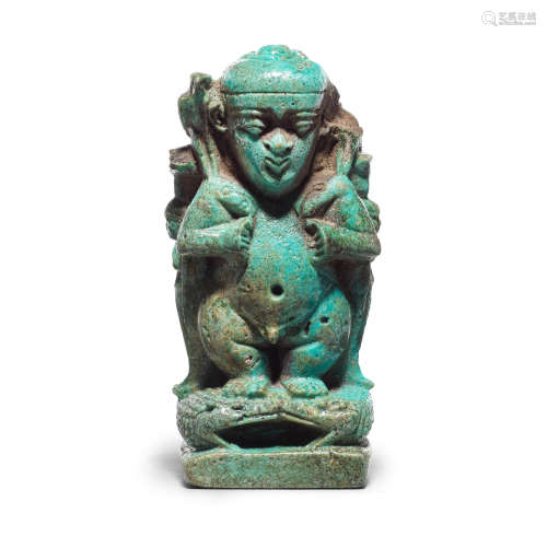 An Egyptian turquoise glazed composition Pataikos cippus amulet