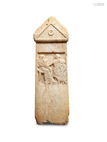 A Greek marble funerary stele