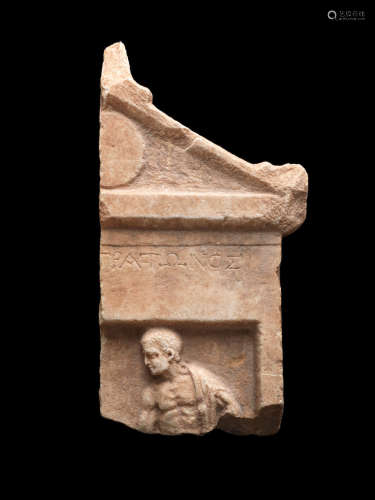 A Greek marble stele fragment