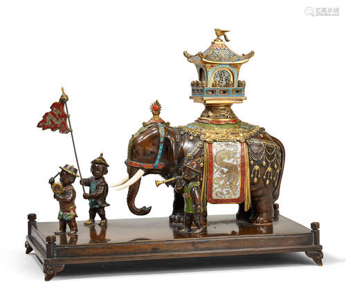 A rare partially gilt-bronze, champlevé-enamel and jade 'elephant and boys' group Qianlong