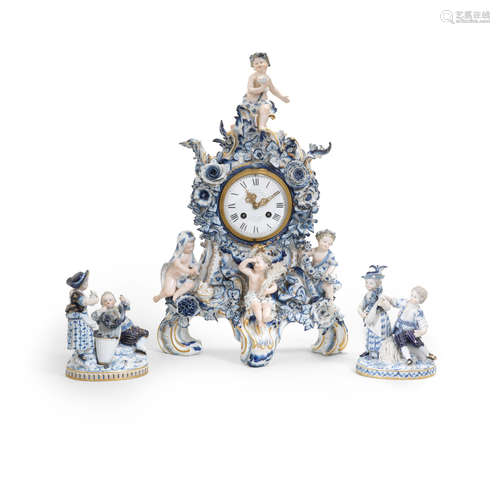 A Meissen figural clock case, late 19th century, together with a pair of Meissen groups, late 19th century