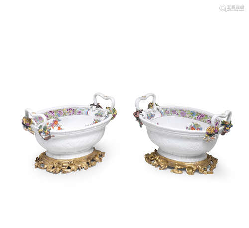 A pair of Meissen gilt-bronze-mounted two-handled oval baskets, circa 1735