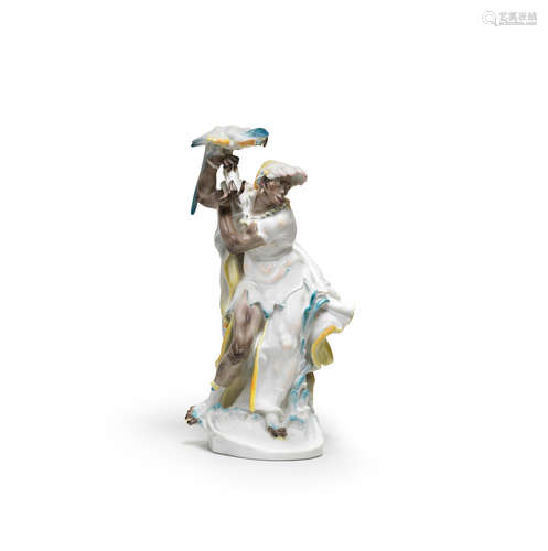 A Meissen figure of a moor with a parrot, dated 1954