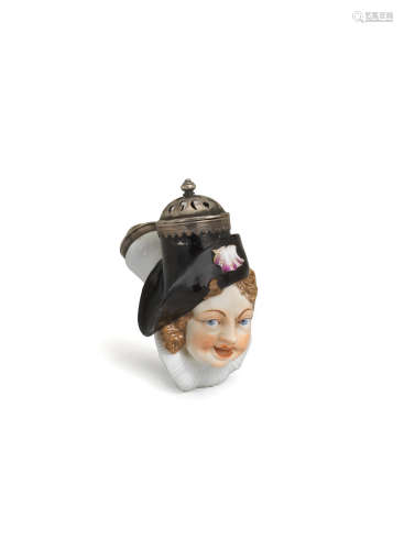 A Nymphenburg pipe bowl in the shape of a Harlequin's head, circa 1757