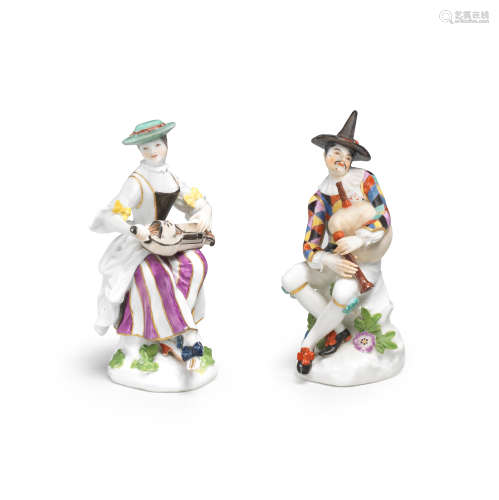 A pair of Meissen figures of Harlequin and Columbine playing instruments, circa 1745