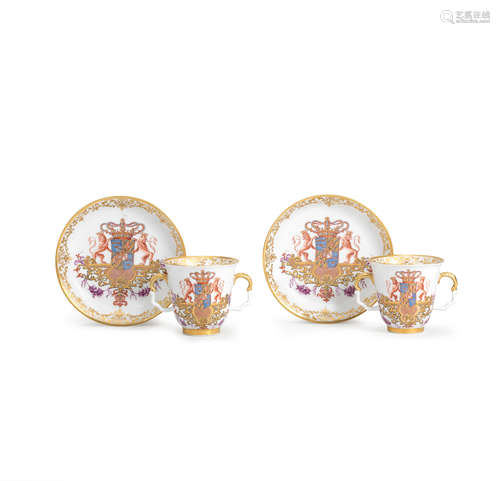 Two Meissen armorial double-handled beakers and saucers from the service for Queen Ulrika Eleonora of Sweden, circa 1734