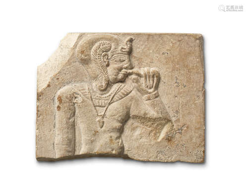 An Egyptian limestone sculptor's model with Harpocrates