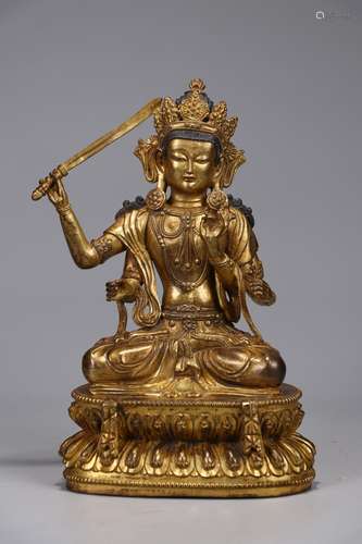 A Chinese Gilt Bronze Manjushri Buddha