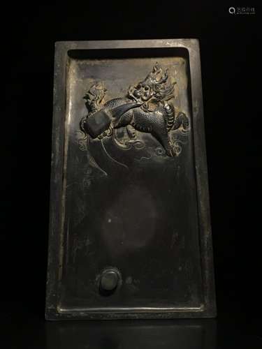 A Chinese Duan Stone With Beast Carving