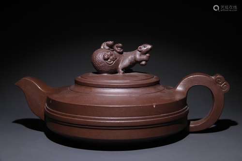 A Chinese Zisha Teapot With Beast Carving