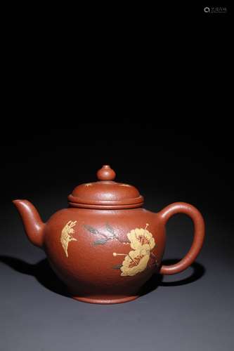 A Chinese Zisha Teapot With Story Pattern