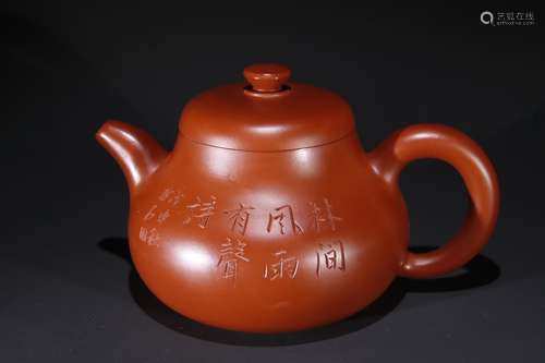 A Chinese Zisha Teapot With Scene Carving