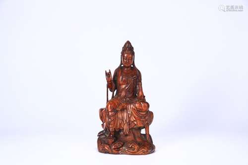 A Chinese Yellow Pear Wood Guanyin Ornament