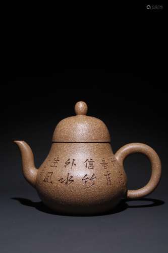 A Chinese Zisha Teapot With Potery Carving