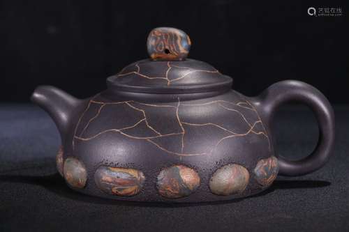 A Chinese Zisha Teapot With Auspicious Pattern