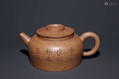 A Chinese Zisha Teapot With Potery Carving