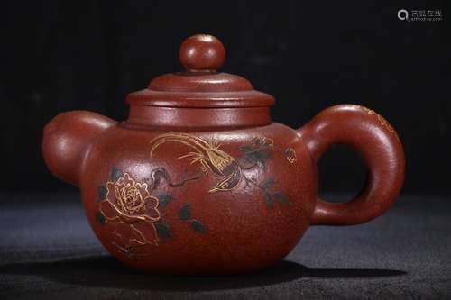 A Chinese Zisha Teapot With Peony Carving And Gilding