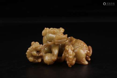 A Chinese Hetian Yellow Jade Beast Carved Pendant