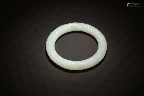 A Chinese Hetian Jade Dragon Carved Bangle