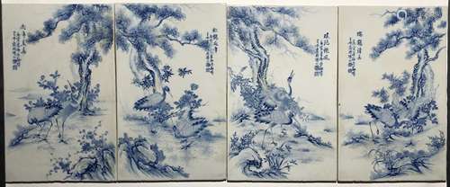 SET OF FOUR BLUE AND WHITE PANELS